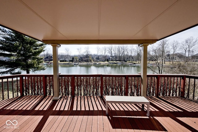 deck featuring a water view