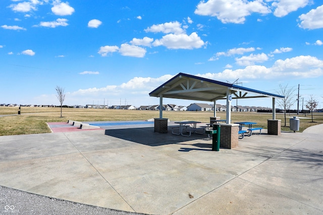 view of community with a gazebo and a yard