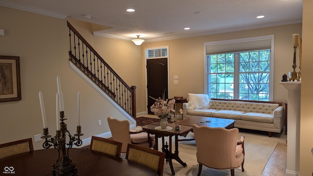 living area with ornamental molding, recessed lighting, baseboards, and stairs