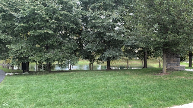 view of yard with a water view