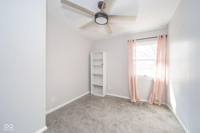 unfurnished bedroom featuring carpet floors, ceiling fan, and baseboards