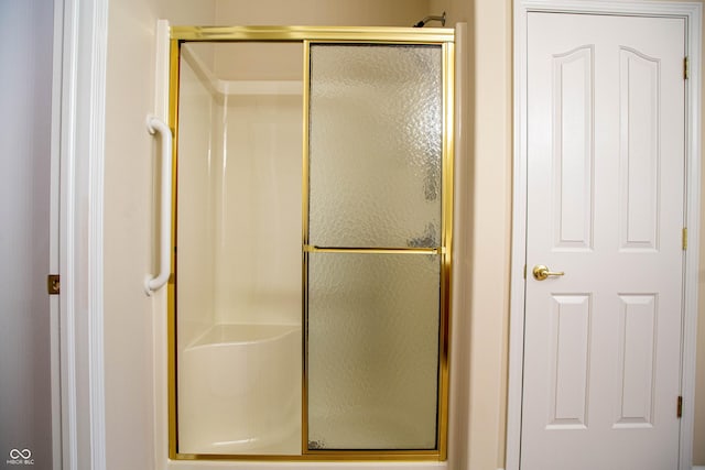 full bath featuring a stall shower