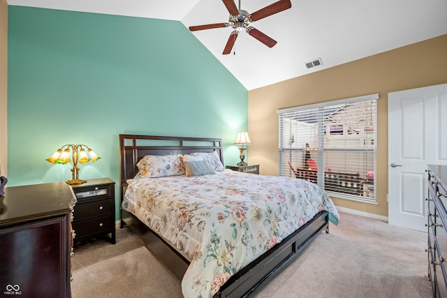 carpeted bedroom with ceiling fan, baseboards, visible vents, and vaulted ceiling