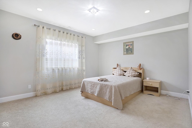 carpeted bedroom with recessed lighting and baseboards