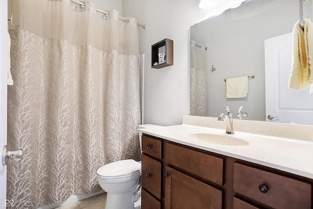 full bath featuring a shower with curtain, vanity, toilet, and tile patterned floors