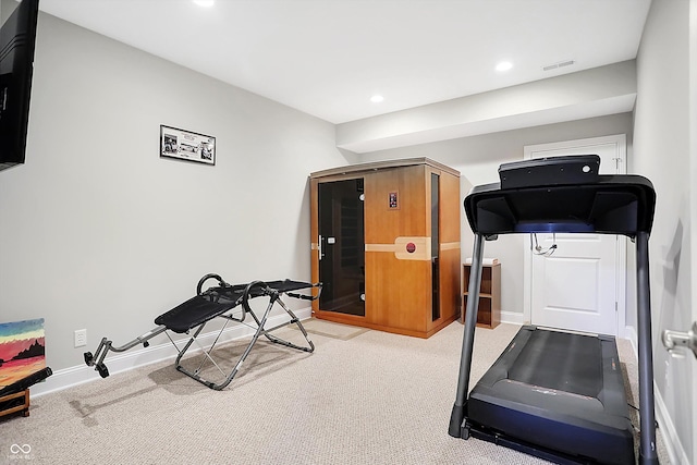 exercise area featuring recessed lighting, carpet, visible vents, and baseboards