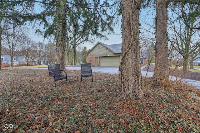 view of yard with a garage