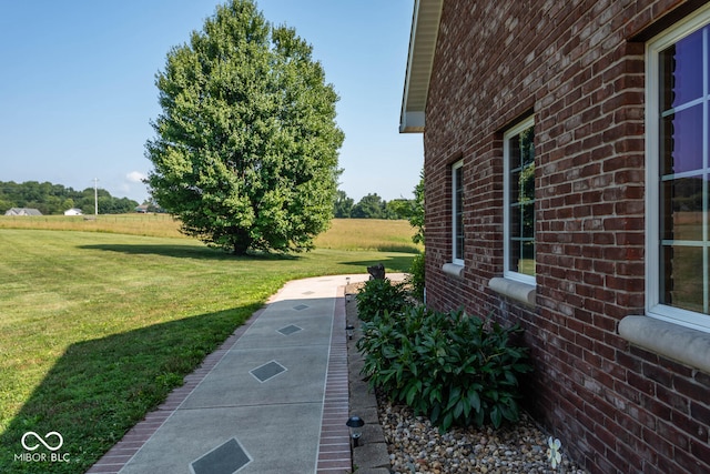 view of yard with shuffleboard