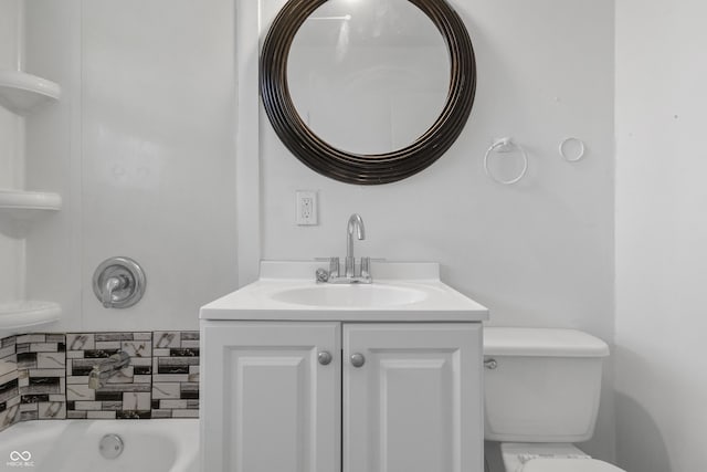 full bath with toilet, a shower, and vanity