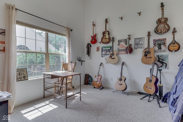 game room featuring carpet floors, plenty of natural light, and baseboards