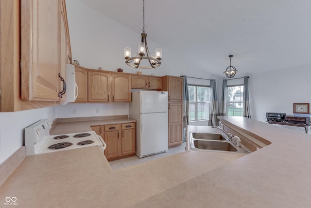 kitchen featuring a chandelier, white appliances, a sink, and decorative light fixtures