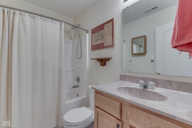 bathroom featuring a textured ceiling, toilet, vanity, visible vents, and shower / bath combination with curtain