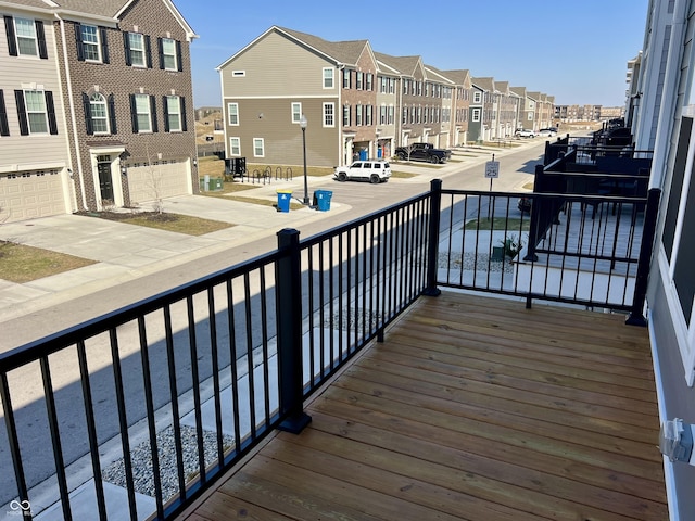 balcony featuring a residential view