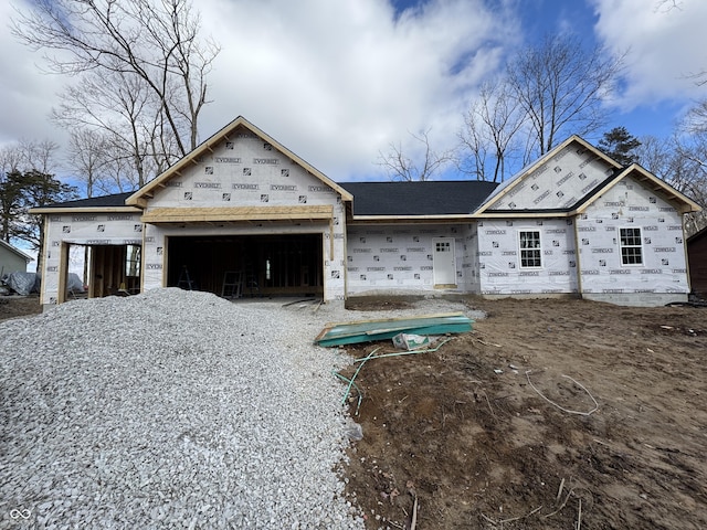 property under construction featuring a garage