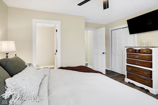 bedroom featuring a closet, ceiling fan, baseboards, and wood finished floors