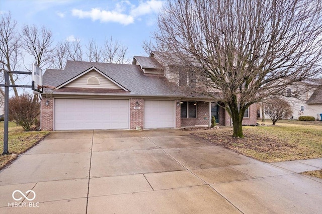 view of front of house with a front yard, roof with shingles, concrete driveway, a garage, and brick siding