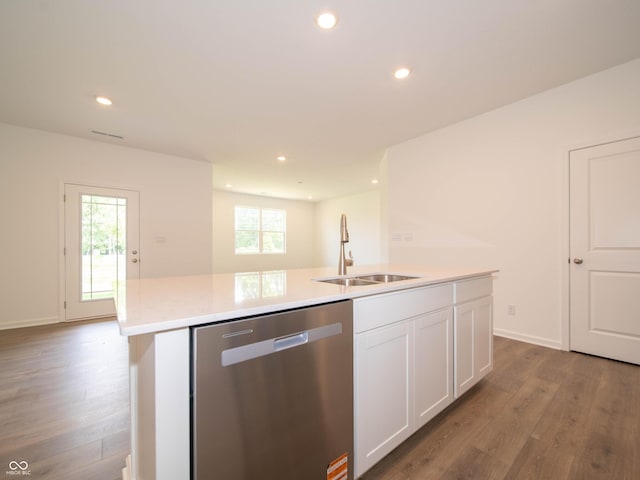 1366 Foxtail Ln, Greenwood, IN 46143 - kitchen featuring stainless steel dishwasher, wood finished floors, recessed lighting, white cabinetry, and light countertops