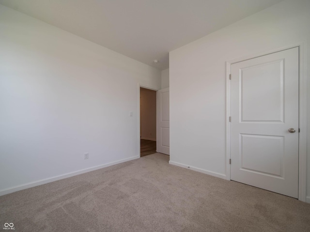 1366 Foxtail Ln, Greenwood, IN 46143 - unfurnished bedroom with light carpet and baseboards