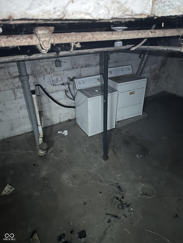 unfinished basement with washing machine and dryer