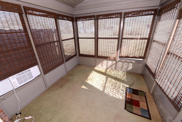 unfurnished sunroom with lofted ceiling