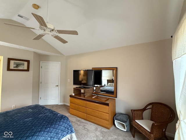 bedroom featuring vaulted ceiling, ceiling fan, visible vents, and light colored carpet