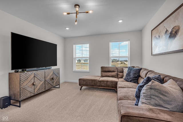 living area with recessed lighting, baseboards, light carpet, and a notable chandelier