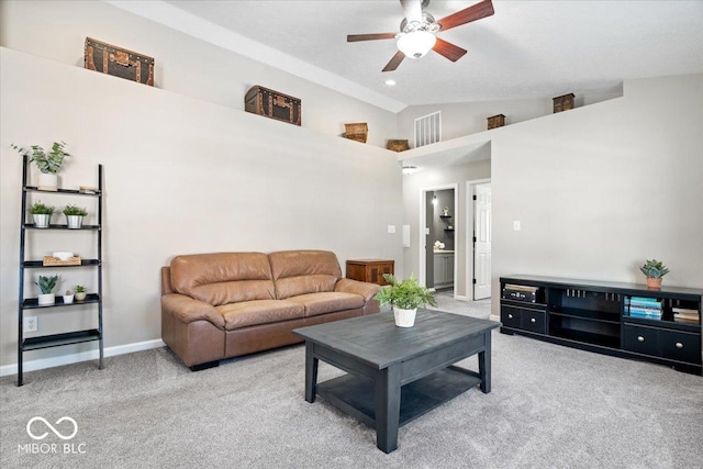 carpeted living area featuring high vaulted ceiling, visible vents, ceiling fan, and baseboards