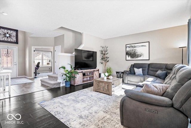 living area featuring wood finished floors and baseboards