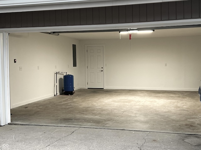 garage featuring baseboards