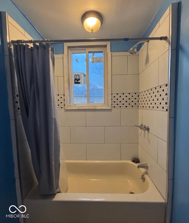 full bathroom with shower / tub combo