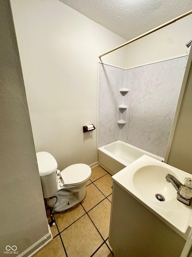 full bathroom featuring a textured ceiling, shower / tub combination, tile patterned flooring, toilet, and vanity