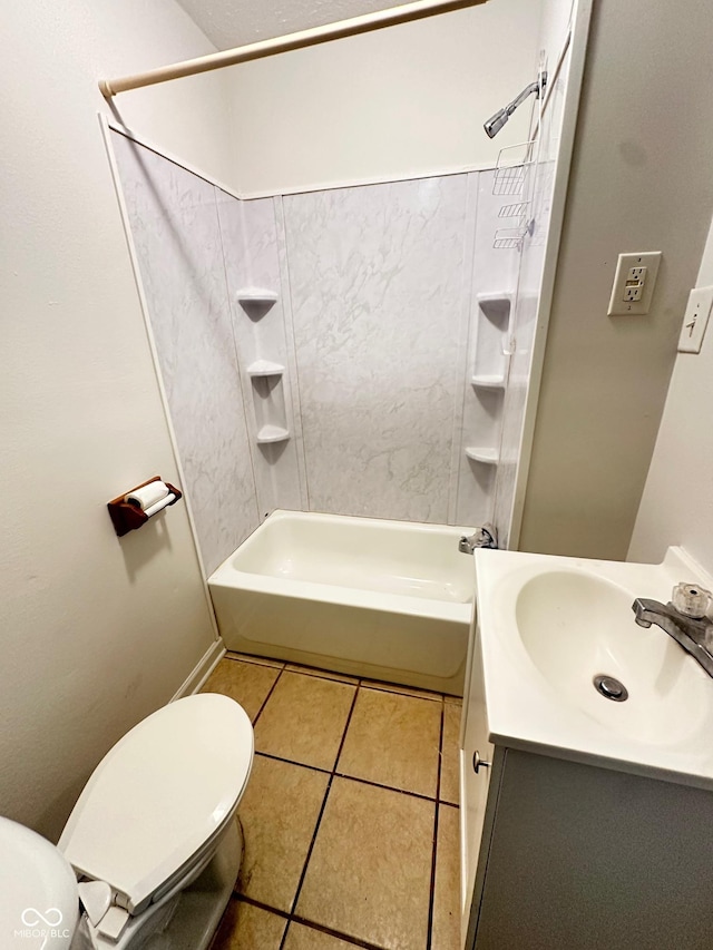 bathroom with washtub / shower combination, tile patterned flooring, vanity, and toilet