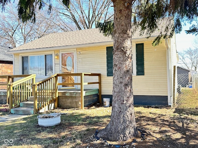 view of front of home with roof with shingles