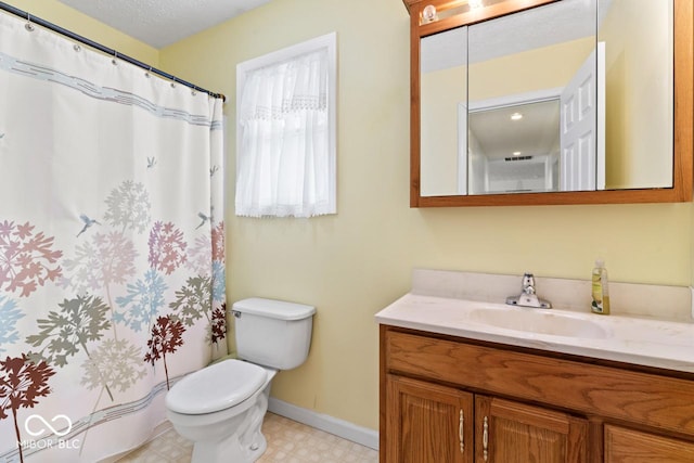 full bath featuring vanity, tile patterned floors, curtained shower, and toilet