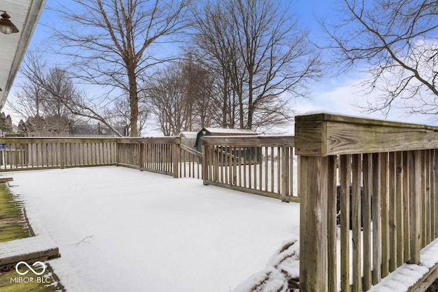 view of snow covered deck