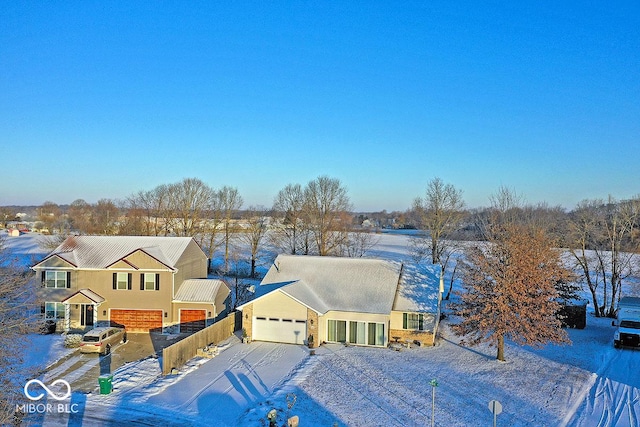 view of front of home with a garage and driveway