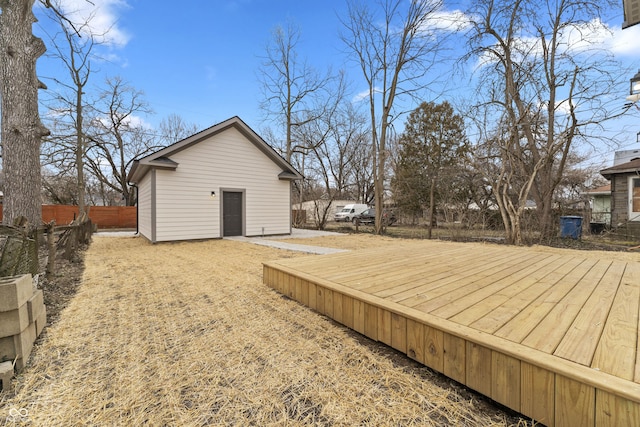 wooden terrace featuring fence