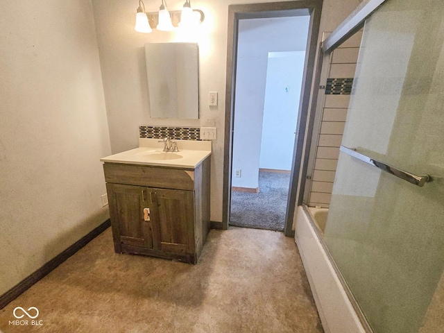 full bathroom with  shower combination, carpet, baseboards, and vanity