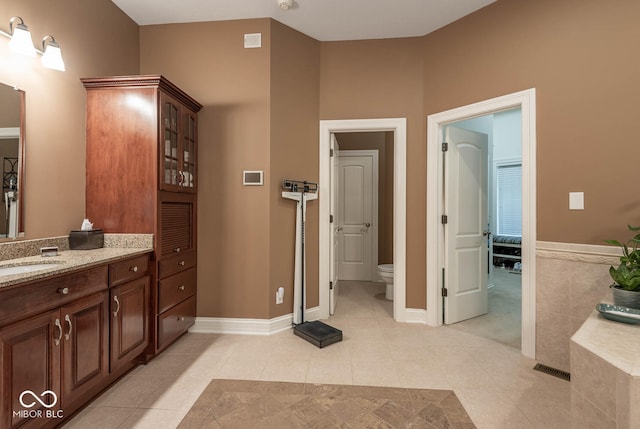 full bathroom with tile patterned floors, visible vents, toilet, baseboards, and vanity