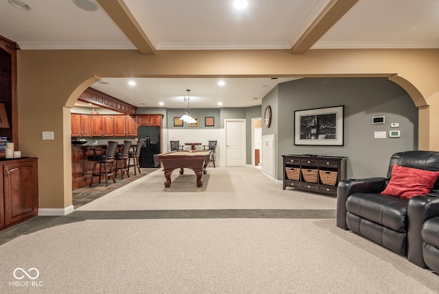 recreation room with wet bar, beam ceiling, ornamental molding, pool table, and light carpet