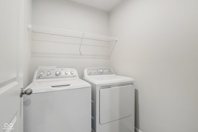 laundry area featuring laundry area and independent washer and dryer