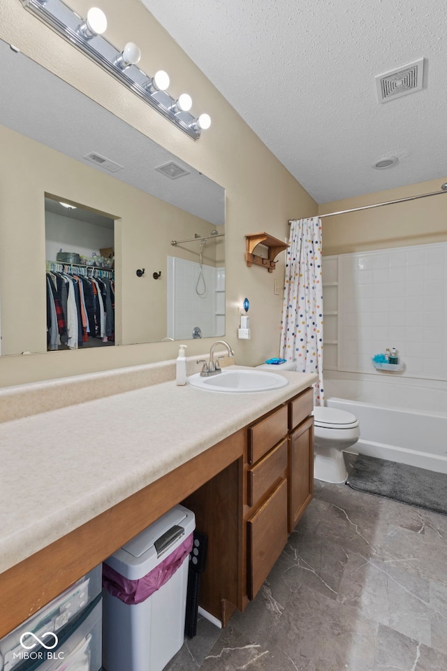 full bathroom featuring shower / bathtub combination with curtain, visible vents, a textured ceiling, and vanity