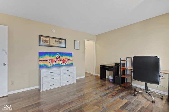 home office with baseboards and wood finished floors