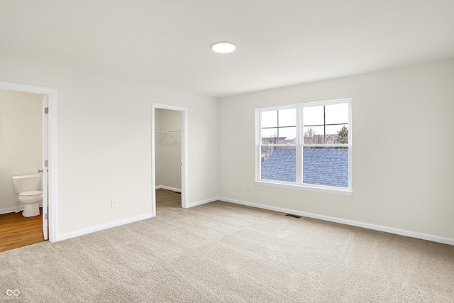 interior space featuring visible vents and baseboards