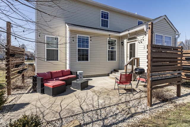 rear view of property featuring an outdoor hangout area and a patio