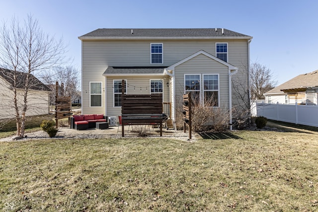 rear view of house with a patio, fence, an outdoor living space, stairs, and a yard