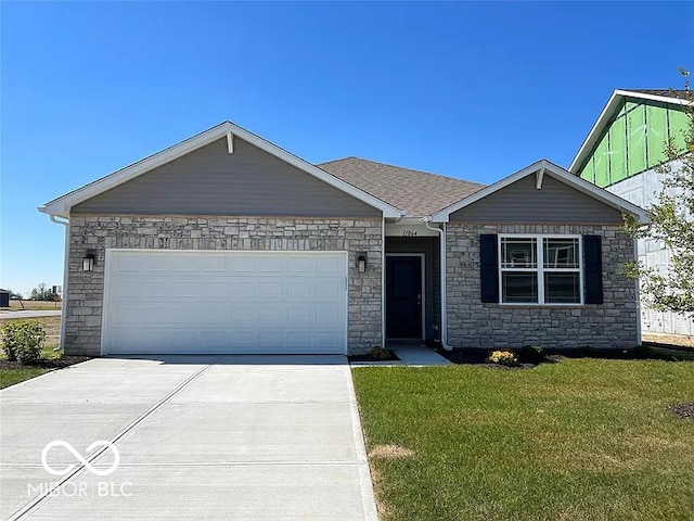 ranch-style home featuring an attached garage, driveway, roof with shingles, and a front yard