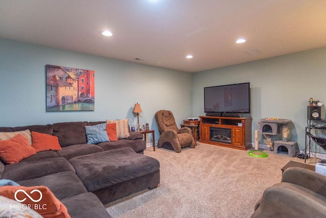 living room with carpet and recessed lighting