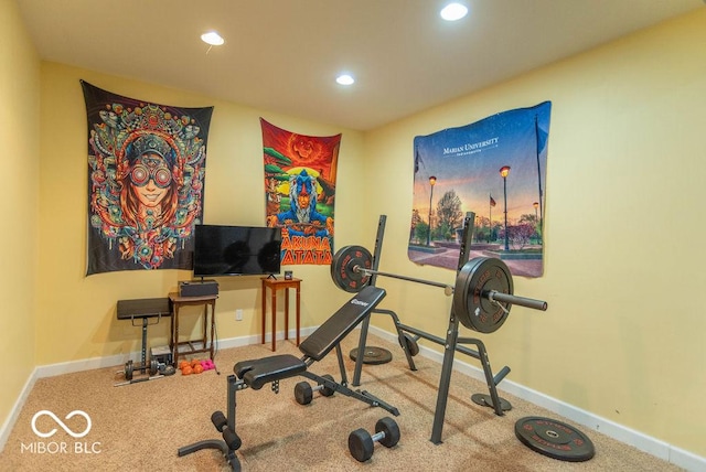 exercise room featuring recessed lighting and baseboards