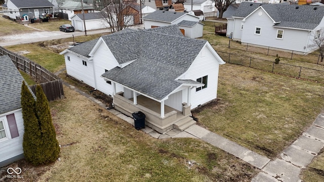 birds eye view of property with a residential view